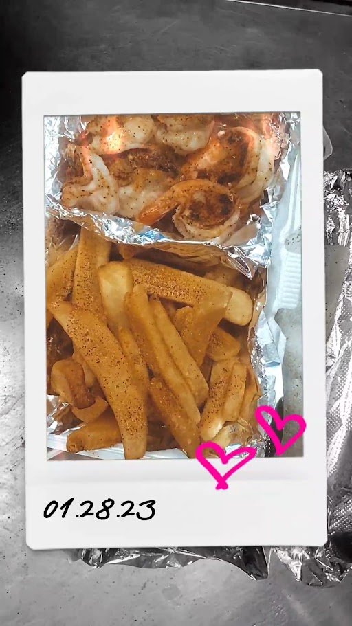 Crisp seafood portions served with fries.