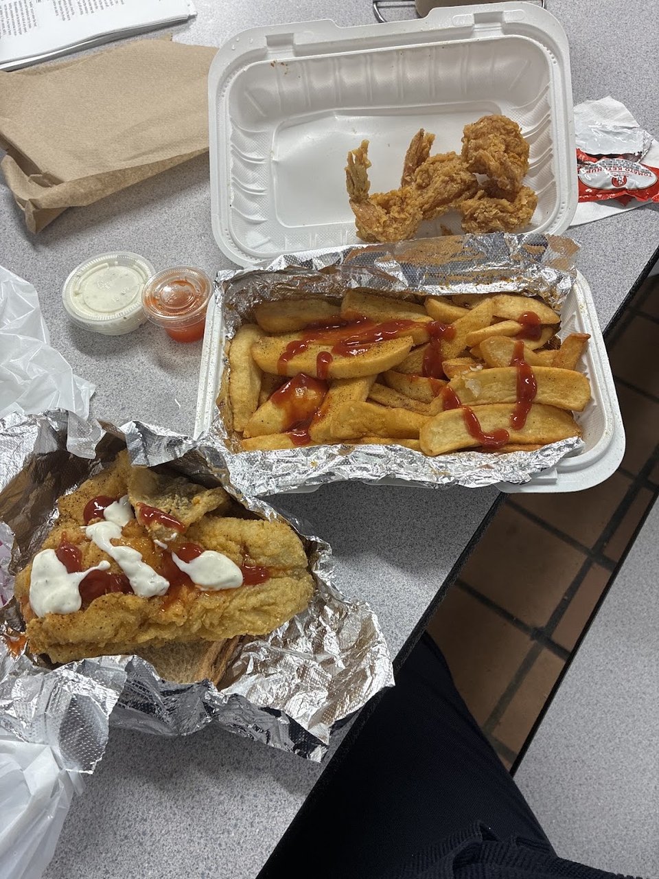 Printed menu listing fried fish and chip meals.