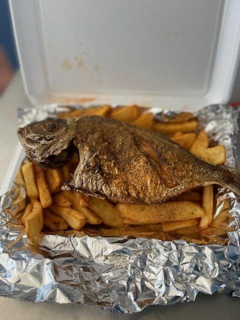 Seafood menu with whiting, catfish, and tilapia options.