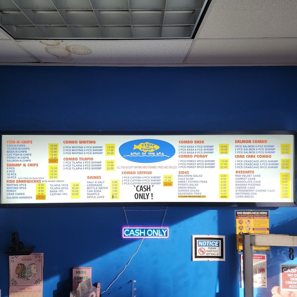 Printed menu listing fried fish and chip meals.