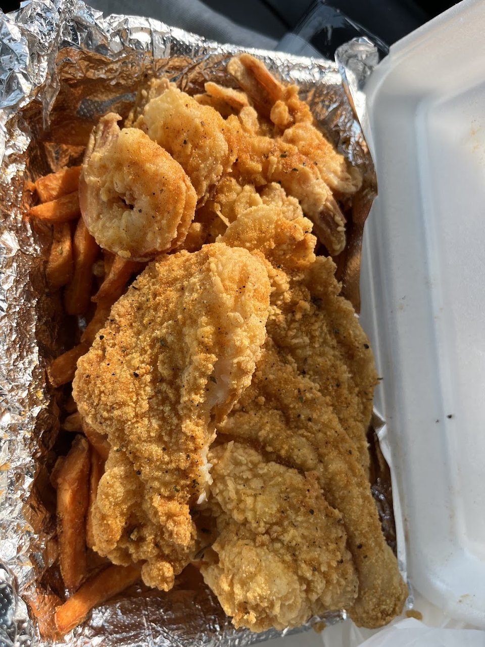 Seafood menu with whiting, catfish, and tilapia options.